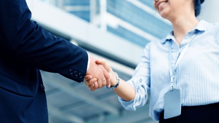 Close up of business people handshake Is an agreement of doing business Accepting, trusting, working as a team for achieving goals. Investment in a joint venture. No corruption. Concept honesty