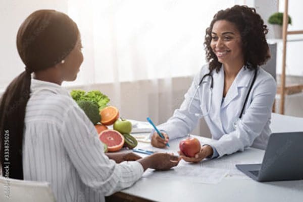 Nutritionist giving advice to patient