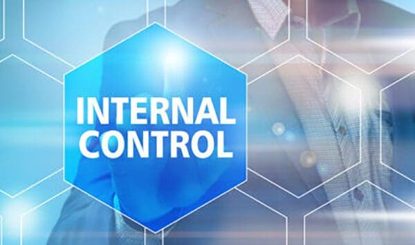 Man with internal controls written in front of him