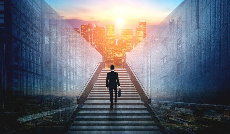 Ambitious business man climbing stairs to meet incoming challenge and business opportunity. The high stair represents the concept of career path success, future planning and business competitions.