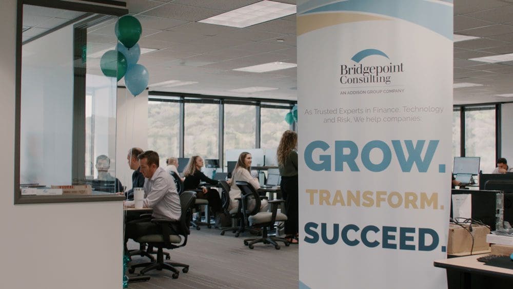 Austin Office with Bridgepoint Slogan - Grow. Empower. Succeed.