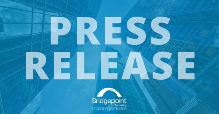 BPC Press Release image with all white BPC logo. Tall buildings with blue overlay in the background.