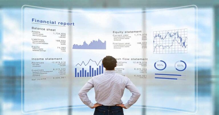 Businessman analyzing financial report data of the company operations (balance sheet, income statement) on virtual computer screen with business charts, fintech