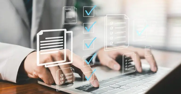 Businessman using laptop with digital checklists