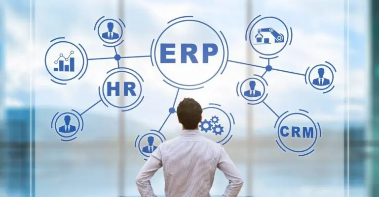 Manager analyzing ERP on AR screen featuring an graphic with interconnected features including BI, HR, CRM